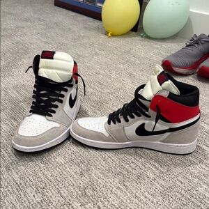 Jordan 1 Mid Men's Black and Red High-Top Sneakers